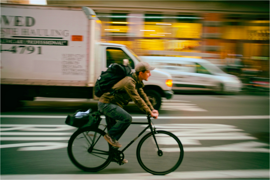 New York Street Photography - Bicycle Messenger in Motion