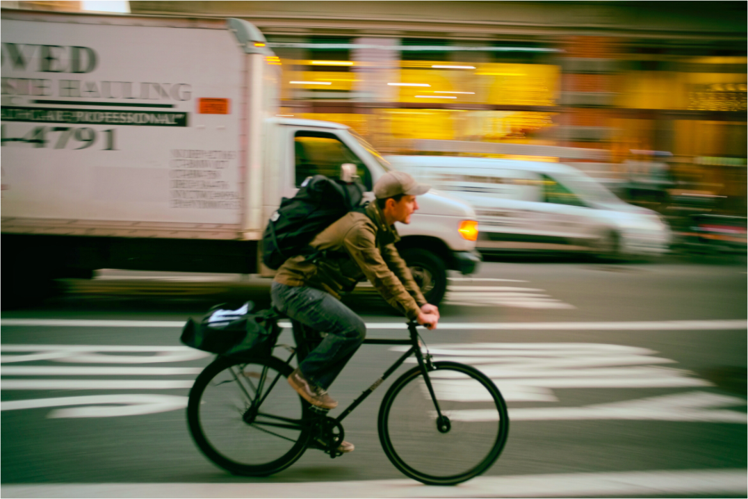 New York Street Photography - Bicycle Messenger in Motion